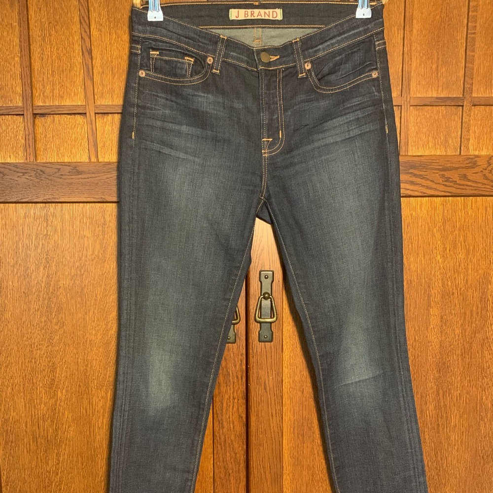J Brand dark denim wash jeans.